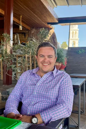 Matt Gardner, smiling at the camera